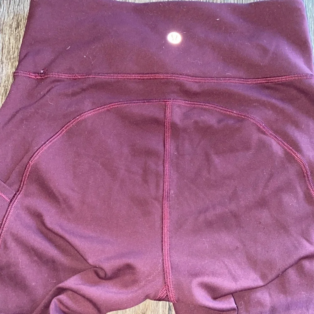 Lululemon Invigorate High Rise Tight 25” Burgundy Sz 4